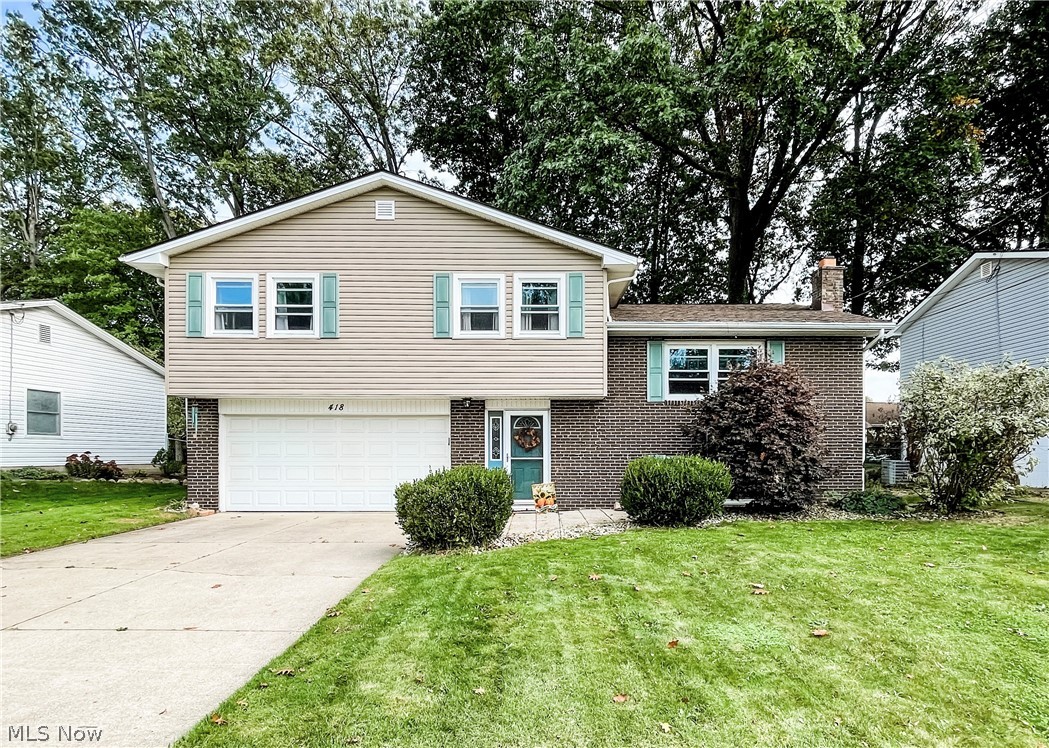 Welcome home to 418 Melony Ln! This Tallmadge split level is ready for you to move right in! This home offers plenty of living space with a large living room and eat-in-kitchen on the main level, 4 bedrooms on the upper level, a bonus recreation / additional living space on the lower level and a spacious mudroom / entry way which connects to the 2 car garage. Outside you'll find well-maintained landscaping and a fully fenced in backyard ready for entertaining with a wooden deck, a shed for extra storage and a designated firepit area. You don't want to miss this one! Call your favorite realtor for your private showing today!