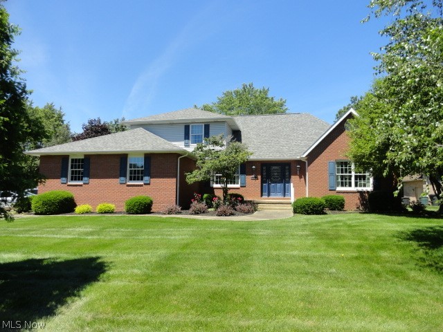 Convenient first floor Master Suite with cathedral ceiling and first floor Laundry.  Nice open floor plan with two story Great Room and gas logs in fireplace, formal Living Room or Office, formal Dining Room and two enormous Bedrooms on the second floor.  Fully applianced Kitchen, Dinette and beautiful view of private park-like backyard.  Newer windows, roof, furnace, air conditioning and water heater.  Call to see today!