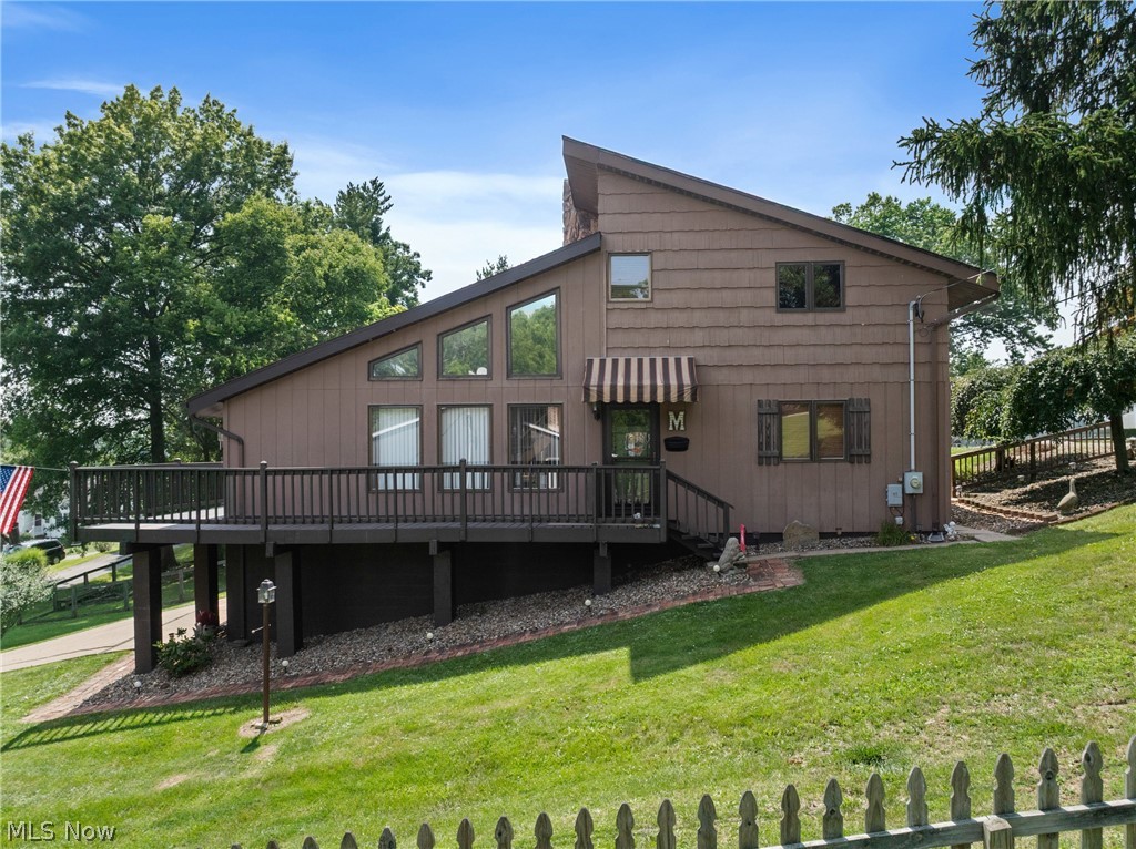 Welcome home to easy living! This inviting home features an open floor plan with a spacious main-level primary bedroom and a full bathroom on each floor for added convenience. Enjoy the finished rec room, a large lot, a wraparound deck with a partially covered area perfect for relaxing or entertaining, and a brand-new shed offering plenty of extra storage. A wonderful combination of comfort, space, and functionality in a great St. Clairsville location!