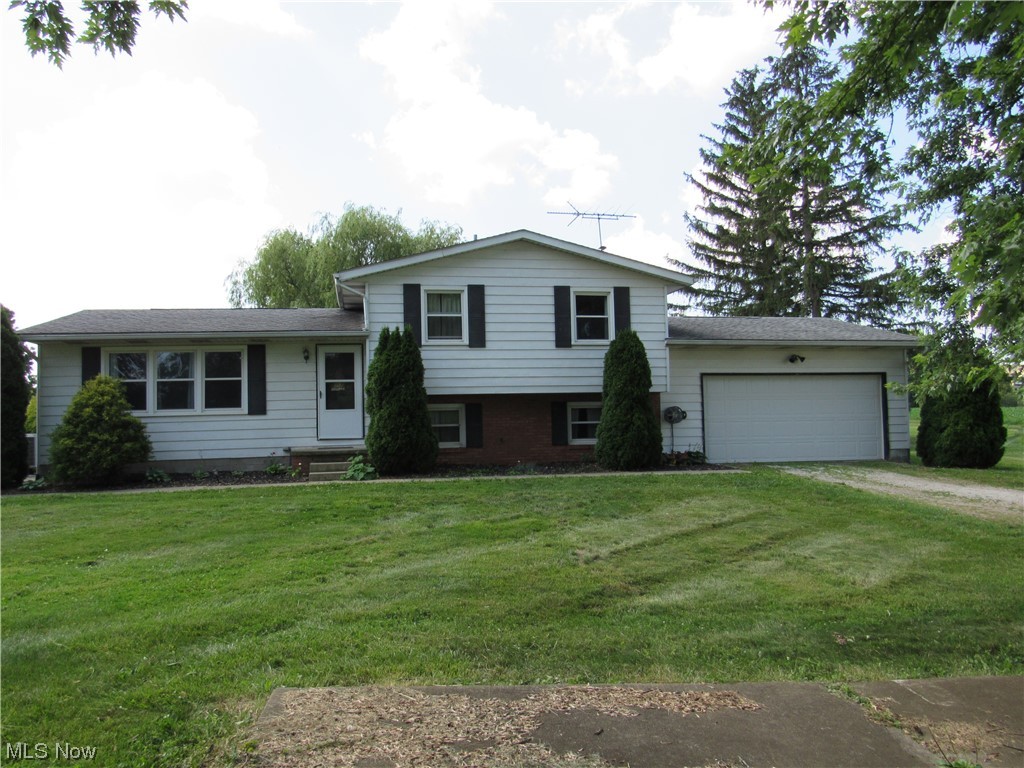 Conveniently located with easy access to Akron and Cleveland, this 3 Bedroom, 2 bath home sits on over 3 acres and is in Norwayne School District. Bring your design ideas. Second bathroom is partially finished.  Plenty of living space with a living room, family room, and partially finished lower level. 2 car garage plus a 24 x 30 outbuilding for all your toys and equipment. Windows and roof approx 10 years. Heat pump, furnace and hot water heater  (2022) Carpet throughout (2022) Septic cleaned and serviced (2022)