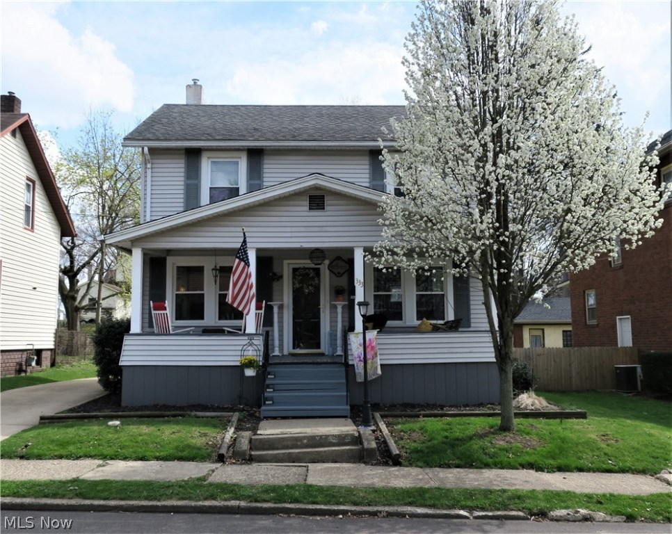Call this one "home!" This wonderful home has great curb appeal and an inviting front porch that bodes, "Welcome!" to your friends and family!
When you step inside, you immediately feel that this is more than a house, it's a home.
Hardwood floors take you from a family-style dining room that is separated from the kitchen by a bar that seats 3, to a very charming living room where you'll have many windows to provide you with natural light. The kitchen is quite unique in that it accentuates a more modern decor, while creatively keeping the nostalgia of its era. The hardwoods continue to the 2nd floor where you'll find 2 generous-sized bedrooms and a third which could also make for the perfect office space if needed. The full bath on the 2nd floor includes a newer tub and shower surround and the floor-plan makes it so that you can configure amenities to suit your preferences in the extra space.
The basement also has a full bath, laundry area, and plenty of room for storage or a worksho