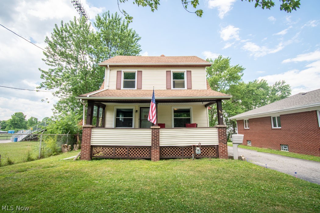 This home has been fully refurbished with all the historical character & details left intact. The large front porch is inviting and cool for summer time enjoyment.  Inside you will find all new laminate floors, fresh paint, 8" baseboards, a gorgeous built in dining room buffet, original to the home. The brick fireplace is a lovely decorative focal point in the large open living room. The kitchen comes equipped with appliances and showcases new glass backsplash. The adjoining morning room is perfect for breakfast and conversation overlooking the back yard. Upstairs are 3 bedrooms, main bath and bonus room which would be perfect as a craft room, office or converted to a walk-in closet. Basement has a completely finished rec. room with new carpet and built in storage. There is also a large utility room and 2nd full bath at basement level. Additional upgrades include: new light fixtures, river rock landscaping, 8x10 tool shed (with electric), new carpet on staircase and in basement, shipla