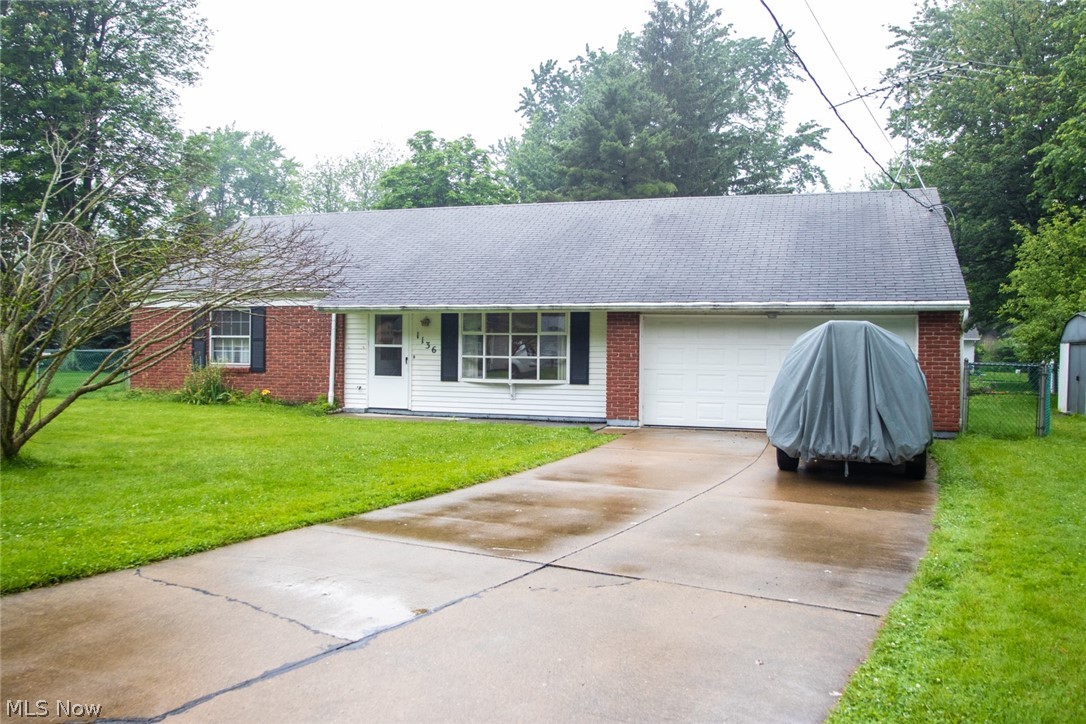 Welcome home to this impeccably maintained Ranch in Madison! This home features three spacious bedrooms with extra large closets. Coming through the front door you are welcomed into the living room. The openness between the kitchen, dining room, and living room makes enteraining a breeze! The two car attached garage entrance is off of the kitchen. The home has a fully fenced in back yard complete with a shed for all of your outdoor storage! Please call a member of The Bissett Team today for your private showing!