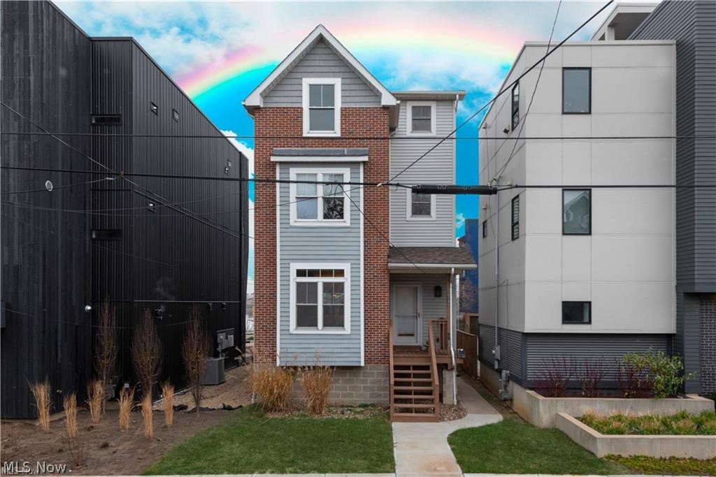 NOW AVAILABLE TO VIEW!
Located in the heart of Tremont, just steps from the Towpath Trail and minutes from downtown Cleveland, this unique property offers the perfect blend of city living and income potential in one of Cleveland’s most sought-after neighborhoods.

The main home features a full living space with two bedrooms and showcases an incredible skyline view of downtown Cleveland — a rare and standout feature that elevates the entire property. The layout provides comfortable, functional living with the added benefit of being in a high-demand urban location.

The lower level includes a separate garden apartment, offering an excellent opportunity for additional income, guest accommodations, or flexible living arrangements. Whether used as a rental or supplemental space, this added unit creates versatility and long-term value.

Surrounded by some of Tremont’s most popular restaurants, parks, and quick access to downtown, this location continues to attract strong interest from both homeowners and investors alike.

Property to be sold as-is.