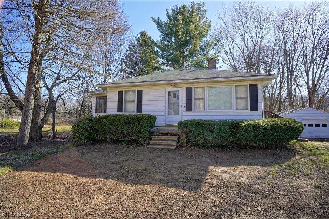 Looking for that perfect yard? Look no more! This adorable ranch in situated on nearly an acre and a half! 
Inside you will find a large living room, formal dining room and an eat in kitchen as well as a 3 season sunroom and updated bath. Outside you will have your own personal oasis with  detached garage  in addition to the attached garage!
The possibilities here are endless! 
Call your favorite Realtor tolday for your private showing!