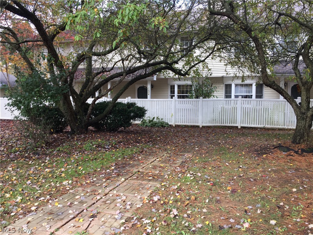 Well cared for 2br, 1.5 townhome in a great location.  Eat-in Kitchen with new back splash leads to a private patio, living room has a brick fireplace with gas logs that leads to a the second partially covered brick patio with privacy fence. There is a Powder Room and Laundry room on the main floor.  Second floor has 2 spacious bedrooms each with double walk-in closets. Also included on the second floor is a full bath with updated LVT flooring.  Townhome has recently been painted through-out, newer carpet on the first floor  Garage is attached with remote.  Call today!