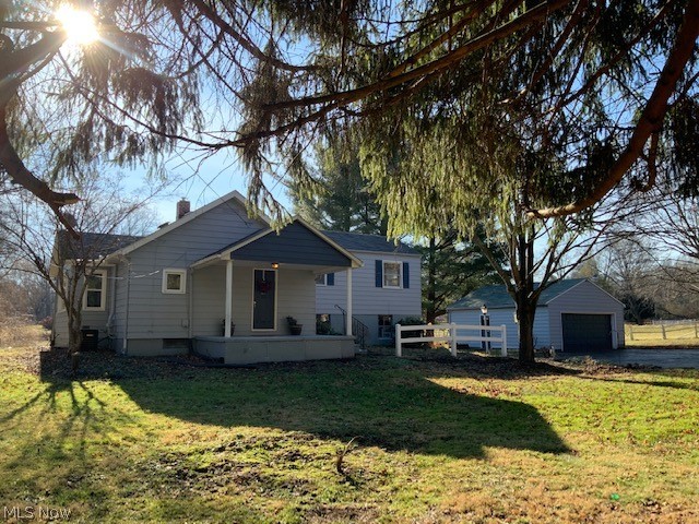 Cute little Bungalow with 3-bedrooms.  Large living room with new carpet, freshly painted kitchen with breakfast bar, dining room with large picture window, bedroom and full bath on first floor.  Up several steps are two more freshly painted bedrooms. Large front porch, detached, oversized 2-car garage, shed, and creek on almost an acre on dead-end street.  New carpet, freshly painted inside and outside. Newer furnace and C/A.  Enjoy country living while minutes from the heart of the city.