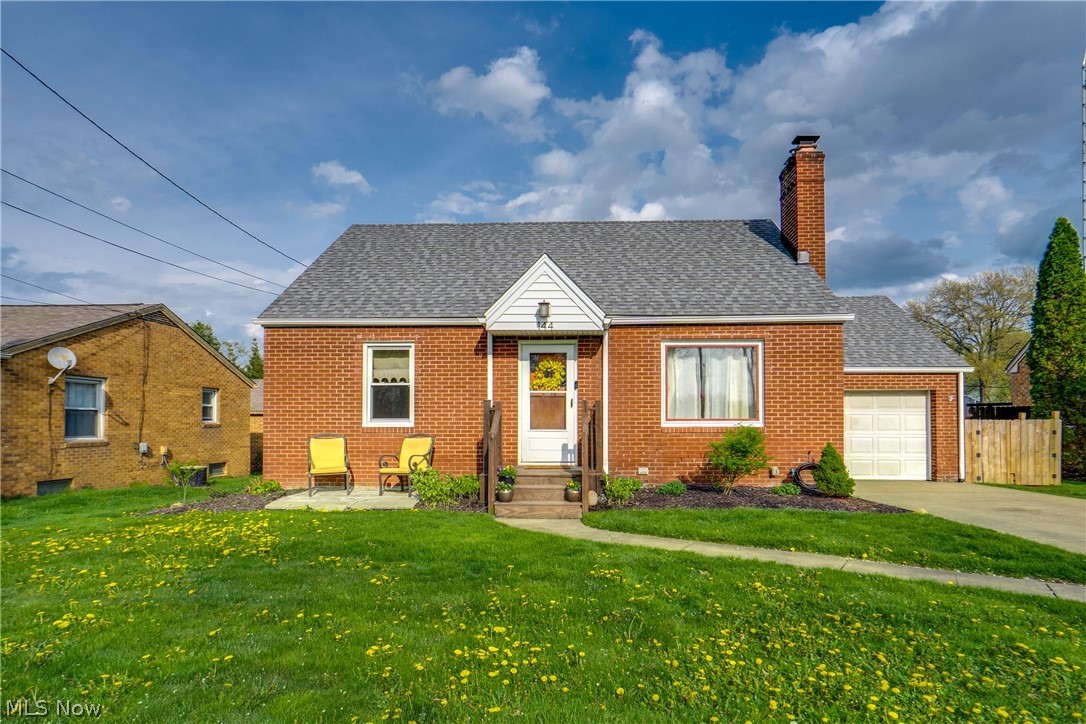 Welcome home to 144 Perry Dr! This brick bungalow features beautiful original hardwood floors and a cozy gas fireplace, perfect for relaxing evenings in the spacious living room. Speaking of the living room, a newer picture window was added to bring in natural light. The main level features two comfortable bedrooms and an updated full hall bath equipped with a tub/shower combo. Upstairs, you'll find a private primary bedroom boasting a walk-in closet. The heart of the home—the kitchen—comes fully equipped with laminate counters and tile flooring. The basement, while unfinished, is fully waterproofed with a sump pump and a second bathroom. Outside, enjoy a one-car attached garage with a parking pad for additional parking or turnaround. Out back, enjoy the fully fenced-in yard ready for summer activities. Plus, a newer roof was installed two years ago. The home is also near amenities, Perry Schools, and Sippo Lake. Don't miss your chance to see this beautiful home; schedule your showing today.