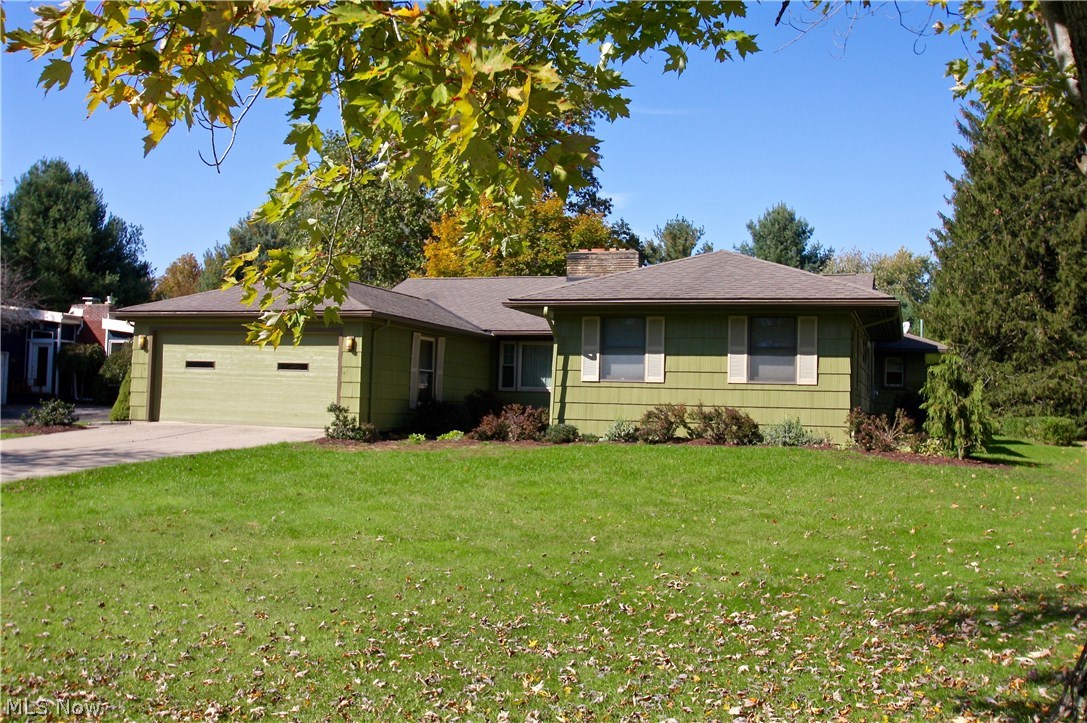 Amazing one floor living. Although its outside appearance may be deceiving, this home is open and spacious on the inside! This updated ranch style home is beautiful inside and out. The gorgeous hardwood floors flowing throughout the home add character and value. Cozy up in your living room next to its wood-burning stone fireplace and huge picture window! Its recently remodeled eat-in kitchen boasts a large walk-in pantry, granite counter tops, Kraft Maid Cabinets with easy soft close drawer and pull out shelves w/ mounted under cabinet lighting and all stainless steel appliances including a range/double oven, dishwasher, refrigerator and microwave to stay. Enjoy your first floor laundry room/mud room or den. Your large master suite w/ en-suite bathroom includes 3 closets and an over-sized jet-powered tub!  Family room addition is naturally illuminated by its many windows and includes a second fireplace (wood burner) and updated half bath. The 3-season sun porch looks out onto the beaut