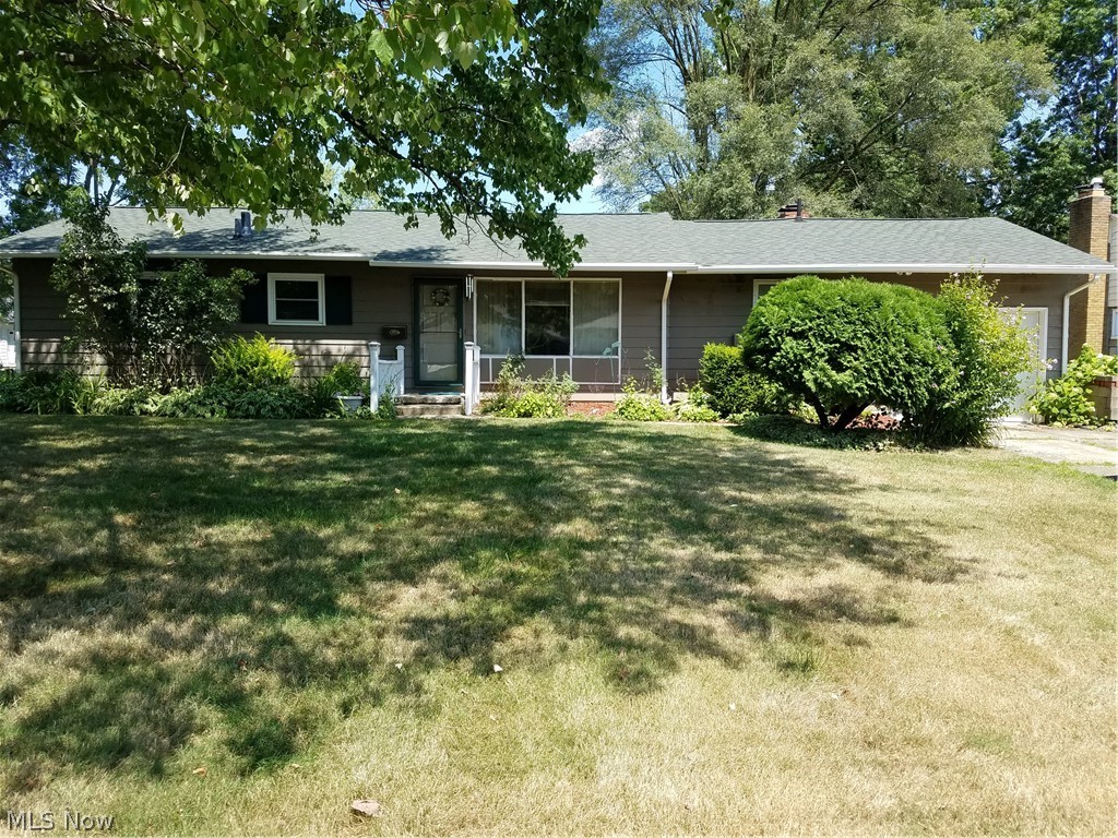 Great location! 3 bedrooms, 1 and a half bath ranch features a welcoming living room with large window and a family room with a wood-burning fireplace. A sun room off of the family room overlooks the backyard. One car garage and concrete drive. Nice, big yard.