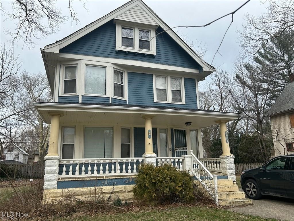 Great Investment & Rehab Opportunity! This Colonial style home, built in the early 1900's in Cleveland's Glenville area is a great home! The large front porch enters an open living room, foyer & separate dining room. The eat in kitchen leads to an attached rear porch. (4) second floor bedrooms with a potential for (2) additional third floor bedrooms with hallway closets. (1) full bath on the second floor & additional commode in the basement. This home offers its original high ceilings and natural wood trim throughout. Although a fixer-upper there is great potential for either a long term investment project or a short term rehab & flip venture for the experienced Investor. Don't miss this opportunity!