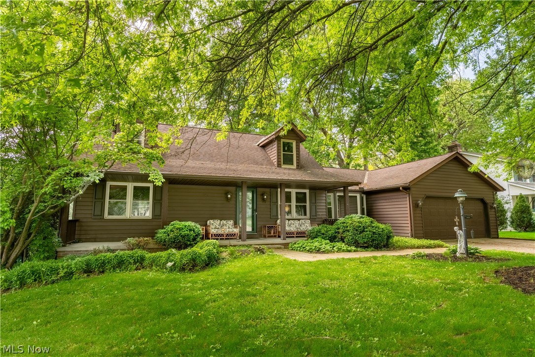 Welcome home to this beautifully maintained and spacious home tucked away on a quiet cul-de-sac within the highly desirable Surrey Hill neighborhood in North Canton City School District. Located at 1649 Harmony Lane SW, this cape cod home offers the perfect blend of comfort, functionality, and flexible living spaces. Featuring a first-floor master bedroom complete with a large walk-in closet and private full bath. The large family room is great for entertaining and has a beautiful brick gas fireplace. The Family room leads right into the eat in kitchen and lovely 3 season room for enjoying peaceful mornings or evenings overlooking the raised back patio.. The bright and inviting layout includes a first-floor laundry room and generously sized secondary bedrooms connected by a Jack and Jill bath. The finished walk out lower level adds incredible versatility with a kitchenette, additional living area, full bath, bedroom space, and abundant storage. Major updates include new A/C and Water Heater (2025), newer windows and siding and some updated appliances. Seller is offering an allowance towards flooring and interior updates. With spacious living areas and a prime North Canton location close to schools, shopping, dining and parks, this home is ready to impress.