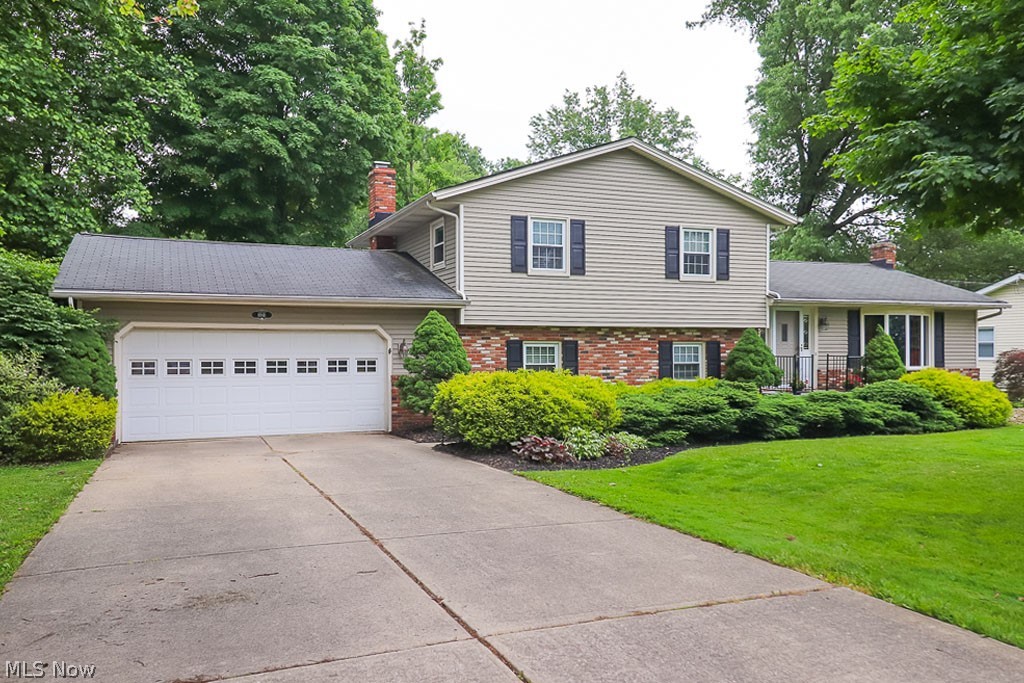 This home is captivating! It has been upgraded throughout with new flooring and freshly painted w. neutral colors. This is a GREAT
home for entertaining it has a Large Kitchen w. Merillat oak cabinets, Corian counter tops that extend out to a Octagon dining area, 2
Sky Lights giving you natural lighting and all of the Stainless appliances stay. When you make your way to the lower level you are
welcomed by a Wood Burning Fireplace, Built-in Entertainment center, Surround Sound, and Vaulted Ceilings. Next, step out to
an AMAZING Sun Room with Nature Stone flr that is wired for a HOT TUB and Speakers. The backyard is just as captivating
with its Professional Landscaped, attractive Stamped Patio, Natural Gas Line for Outdoor Grill, and PlaySet with new equipment. Oh, did I mention the
mud room, Master Bathroom and Family room has RADIANT heat under the floors?  New blinds stay with the home.  Home Warranty included.