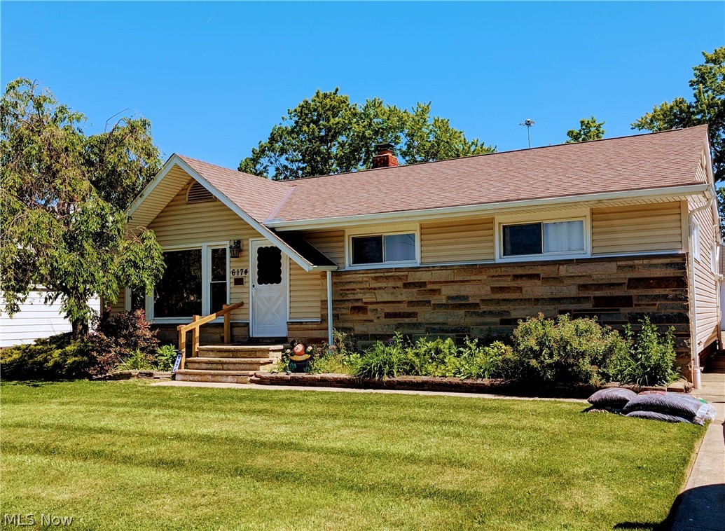 Welcome Home to this Charming Ranch offering functional one floor living situated at 6174 Westerham Road centrally located in Mayfield heights within the celebrated Mayfield School District!! Upon entering you’re welcomed to a small foyer leading to a bright front living room with its large bay window with a view of the landscaped front yard. Lots of natural light throughout this home. As you transition thru to the dine-in Kitchen there is a sliding glass door that enhances this area with space with light and access to the backyard. Beyond the dine-in area you will find convenient kitchen cabinets and Laminate counter space, a stainless steel sink with a view of the backyard. All newer 2022 Stainless steel kitchen appliances. The first floor is completed by three bedrooms and one full and one half bath. The Master bedroom features an attached half bath. The partially finished basement provides additional living space including a recreation room, a laundry area and Utility room. Outside consists of a large backyard and a 2.5 car Detached Garage, a concrete patio for outdoor entertaining, potential gardening area behind the garage fully fenced in yard. Newly installed roof 2025. Close to shopping, many restaurants, walking distance to parks and pool!! All the amenities Mayfield Heights has to offer, this home combines comfortable convenience, functionality, and a great location!! Point of Sale compliant. This property is being sold in as-is condition; the seller will make no repairs.