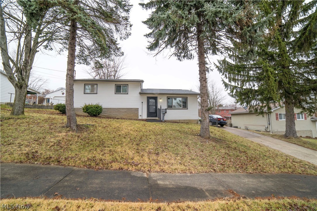 Multi-Level Home with vinyl siding. Living Room has a decorative stone accent wall. Kitchen has a built in breakfast table with a dinette area. 3 Bedrooms and a full bath on upper level. Partial Basement has a toilet and shower and is a walk-out to the Backyard. Roof 3 years old replaced in 2015, Shed for extra storage. Central Air. Already Cash Flowing, gross income $8,100 a year. Tenant in month to month lease, all Buyers Welcome! Call Today!