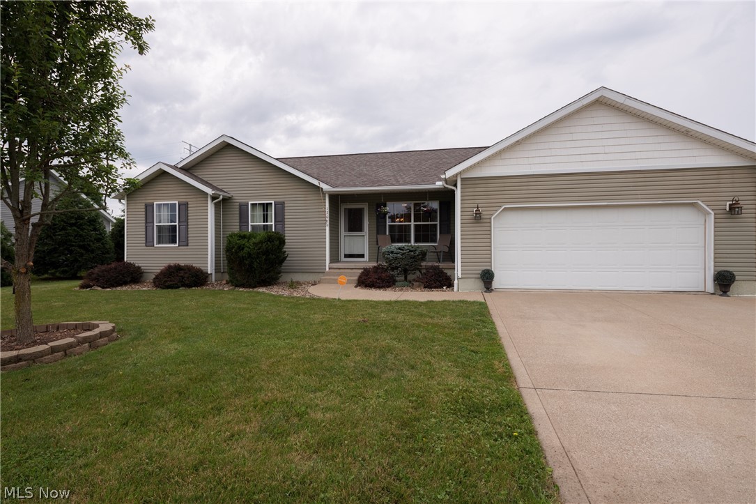 Wow! Check out this stunning Ranch located in beautiful Strasburg. This gorgeous 3 bedroom, 2 full bath home is situated in a quiet neighborhood and has close to access to all major highways so the location could NOT be better. Make your way up to this beauty and prepare to be amazed. First you come up to the charming front porch and into the front door. You are greeted by the warm embrace of the open concept living room which offers vaulted ceilings and picturesque windows allowing for a ton of natural light. The open concept flows perfectly into the dining area which has ample space for those that like to entertain. Just off the dining room is a door leading out to your private, fully fenced in backyard and a concrete patio that would be perfect for enjoying those warm Summer evenings just ahead. Making your way back inside you come to the massive kitchen complete with beautiful oak cabinets, island peninsula and newer appliances. Continuing through the dining and living spaces you c