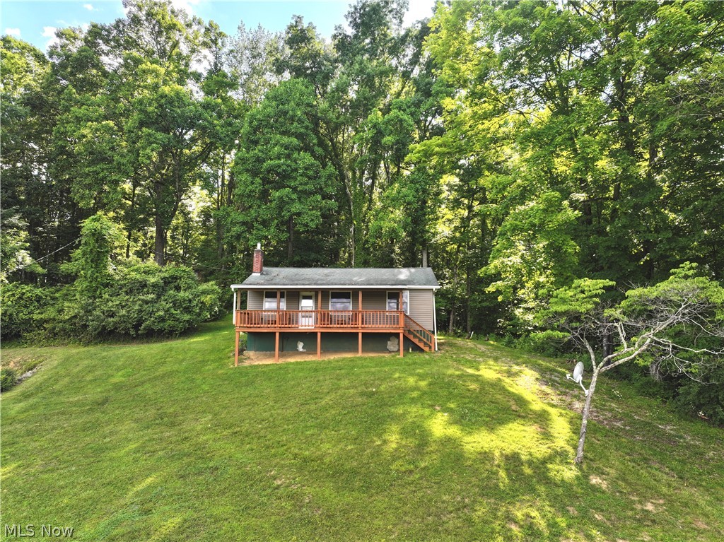 Excellent opportunity to own a well-maintained cabin at Piedmont Lake! Enjoy seasonal lake views from the covered
front porch. The cabin is situated on a 0.36 acre lot that is owned, not leased. It features 2 bedrooms, 1 bathroom, a
spacious kitchen, and a cozy living room with a fireplace. Located less than one mile from the Piedmont Lake Boat
Launch, the property offers convenient access to a variety of outdoor activities, including fishing, boating, swimming,
hiking, and picnicking. The cabin is located approximately 20 minutes from Egypt Valley Wildlife Area, making it an
ideal camp for hunters and anglers. The property has been owned and enjoyed by the same family for more than 39
years. All seller-owned mineral rights will transfer with the property.