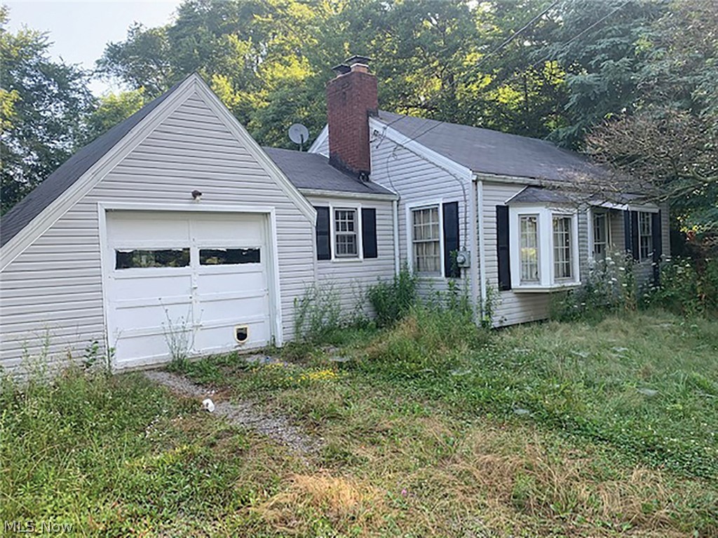 Very Cozy Vinyl-Sided, Two-Bedroom Bungalow Home with Attached Garage & Rear Deck in The Country - Washington Twp. – Marlington Schools - To settle the Jon Batten Estate, Stark Co. Case #235665, all sells on location: TUESDAY – SEPTEMBER 8, 2020 – 5:30 PM. Built-in 1948, 840 sq. ft., full basement, modern FA gas heat, family & living room with fireplace, needs primped and updated. Great country setting. Lots of potential. Open for veiwing 2 hours before or by appointment. TERMS ON REAL ESTATE: 10% down auction day, balance due at closing. A 10% buyer’s premium will be added to the highest bid to establish the purchase price. Any desired inspections must be made prior to bidding. All information contained herein was derived from sources believed to be correct. Information is believed to be accurate but not guaranteed.