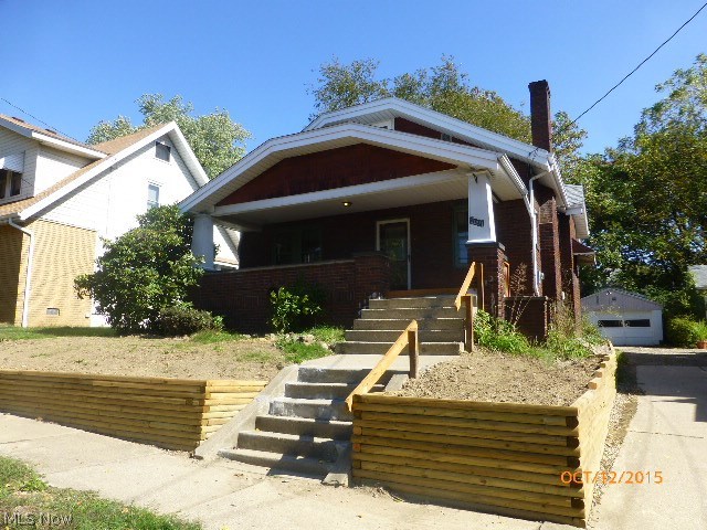 Great Value! Great Price! All fixed up and ready to go! 
Very Nice 1-1/2 story Bungalow. 3 big bedrooms. Updated bath. New cabinets in kitchen. New plumbing and fixtures throughout. 
Fresh landscaping too. Just add your porch swing on the inviting Open Front porch. New exterior trim paint. Freshly painted and carpeted interior.
Cozy living room with woodburning fireplace. Some new vinyl windows in upstairs and Dining room.  
Close to all kinds of shopping! Close to new public school being built a few blocks away.
