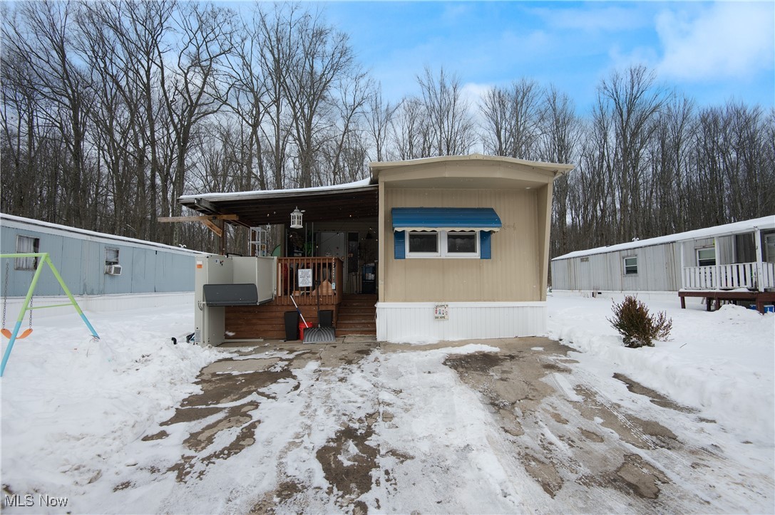 Step into comfort with this charming double-wide mobile home! Boasting three spacious bedrooms, and one-and-a-half bathrooms, this inviting home is perfect for families or anyone seeking extra space. The open layout is full of natural light and you'll love the convenience of a double-wide design. Don't miss out on this fantastic opportunity to make it your own.