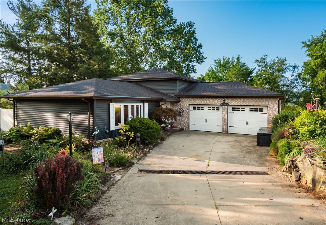 Welcome to 61380 Summit Road in New Concord! Nestled on a quiet cul-de-sac and surrounded by the peacefulness of 0.74 acres, this 3-bedroom, 2.5-bath split-level home offers the perfect place to settle in and make memories. From the moment you arrive, you’ll appreciate the privacy, spacious setting, and inviting outdoor spaces this property has to offer.
The large back deck, complete with a hot tub, creates the perfect retreat for relaxing evenings, entertaining guests, or simply enjoying the quiet surroundings. Inside, the home offers a comfortable layout with thoughtful updates throughout, including newer flooring, updated kitchen appliances within the last year, siding and shutters (2022), garage doors and openers (2022), deck and back door updates (2022), a fenced backyard (2021), and a 200-amp electrical panel (2020).
Offering the rare combination of a peaceful location, generous outdoor space, and modern updates, this home provides the privacy you desire while still being conveniently located near local amenities. Don’t miss the opportunity to make 61380 Summit Road your new home!