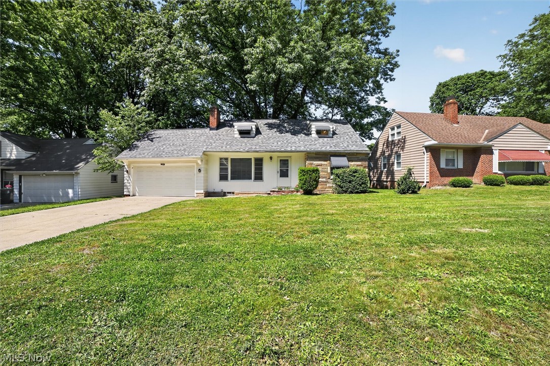 Beautiful, Spacious Cape Cod on a Quiet Street! This home has so much to Offer! plenty of space and flexibility. The first floor features a large living room with decorative fire place , formal dining room, eat-in kitchen with new quartz counter top , two bedrooms, a full bath, plus large spacious bonus room with a separate direct  entrance  that can be used as a bedroom, office, or family room. The second floor boasts a large primary bedroom with a half bath and additional bonus space, perfect for a sitting area, office, or extra storage. Fenced-in backyard, Back Yard Patio , New A/C (2026)  New Roof 2024 New Hot water tank 2023 convenient location close to schools, shopping, hospitals, and with easy access to downtown Cleveland Don't miss this wonderful opportunity?Schedule a viewing today!