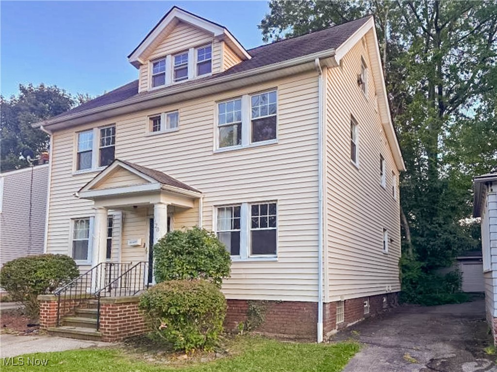 Fall in love with this gorgeous Colonial in a highly desirable suburban neighborhood! Boasting approx. 1,728 sq ft, 4 bedrooms, and 2.2 bathrooms, this home perfectly blends charm, space, and lifestyle. The bright living room welcomes you with a cozy wood-burning fireplace, flowing seamlessly into the dining room with chandelier and open kitchen—perfect for entertaining family and friends. Upstairs, three bedrooms include one with a private balcony perfect for morning coffee, reading, or enjoying fresh air. Additionally, there’s a sunroom bathed in natural light, ideal for relaxing or cozy gatherings, and a full bath with tub/shower combo. The finished third floor features a suite with full bath plus a versatile bonus room—ideal as a 5th bedroom, office, or family retreat. The unfinished basement adds endless storage possibilities. Outside, relax on the inviting side porch or park with ease in the detached 2-car garage. Conveniently near schools, parks, cafes, restaurants, and grocery stores, this home offers the perfect balance of comfort and convenience. Every level of this home invites warmth, gatherings, and cherished memories. Don’t miss your chance—schedule your showing today! Please note that the information and property details provided in this listing, including utilities and room dimensions, are approximate and considered reliable but not guaranteed. It's recommended to independently verify these details if you are considering a transaction based on this listing. The seller/current owner does not guarantee that all property information has been included in this MLS listing. Additionally, the buyer is responsible for all inspections and any city requirements to close.