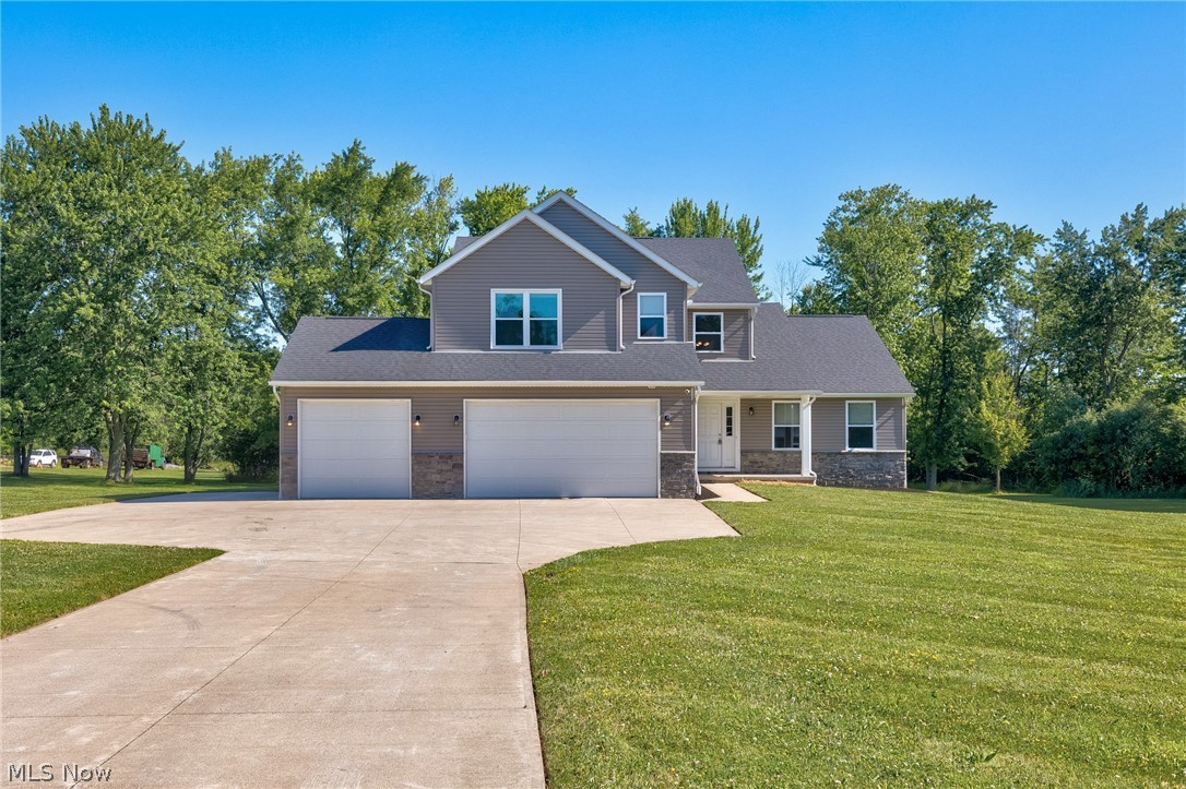 Beautiful custom built 1 owner 3/4 bedroom 4 bathroom home sitting on 14 picturesque acres. Welcome your guests into the front door and immediately you see and understand the beauty of this property. A full wall of windows and a 2 story great room sets the tone. A spacious living room, open concept custom fully applianced kitchen and dining room with direct access to the large deck offers so much inside outside living and entertaining. The 1st floor master suite is tucked away privately and provides an incredible place for peace and privacy. A grand size bedroom, his and her (2) walk in closets and a full ensuite with garden tub, separate walk in shower, double vanity and a private toilet room.. A perfectly placed mud room, drop space off of the garage entrance, 1st floor laundry and a half bath finish off this beautiful 1st floor. Upstairs you will be greeted by an oversized loft which could easily be converted to a 4th bedroom, another smaller loft space, 2 nicely sized bedrooms and a full bathroom. The lower level is unbelievably beautiful. Offering an additional 1800+ sq ft of finished space, full bathroom, full bar with 2 beverage/wine refrigerators, 2 tvs, a special rock climbing wall for the kids and a dedicated office or guest bedroom. Enjoy the view while soaking in your very own hot tub (included). So much opportunity with this land. Keep it all and start exploring or sell off a few acres in the back of the property. The back of the property crosses Myrtle and has access from Maxwell perfect for building additional houses.