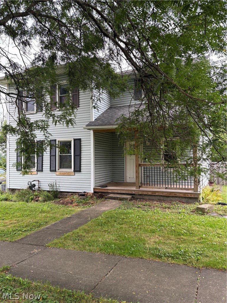 Great location for this 3 bedroom home in the heart of Canfield. On the main floor, you will find a spacious kitchen with granite counter tops, subway tile, and an island.  You will also find a formal dining room, living room, and large full bathroom to complete the first floor. The second floor offers 3 spacious bedrooms. There is also a new covered front porch.  This house is located within walking distance to restaurants, coffee shop, bike trail, library, banks, Village Green, and just minutes away from Canfield school.