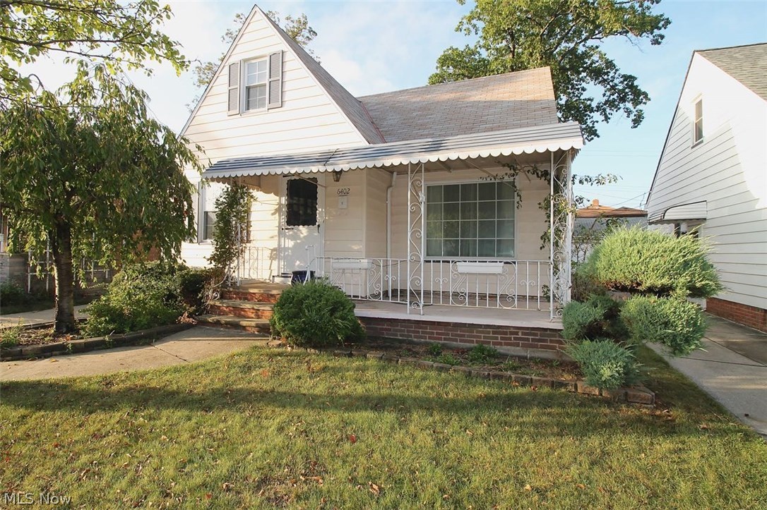 Freshly painted and ready for YOU.  This three bedroom Bungalow welcomes you home with beautiful arched doorways as you enter the large living room area with recessed lighting flows nicely into the kitchen and eating area.  You will find hardwood floors under the carpet throughout the home as well. The main floor bathroom has been recently remodeled (2017); spacious kitchen with eating area and plenty of storage. In 2010 there were many updates completed: A/C, High Efficiency Furnace, Newer Outlets throughout the home, painted exterior, newer side door and garage roof was installed. Upstairs offers a finished room which could be used as a fourth bedroom, craft area or another office.  Ceiling fans throughout and tons of closet space.  Newer faucets and light fixtures along with blinds and curtains.  Partially finished basement with a wet bar and sitting area; great for entertaining or just a place to hang out and lifetime waterproofing and glass block windows.  There is also a workshop