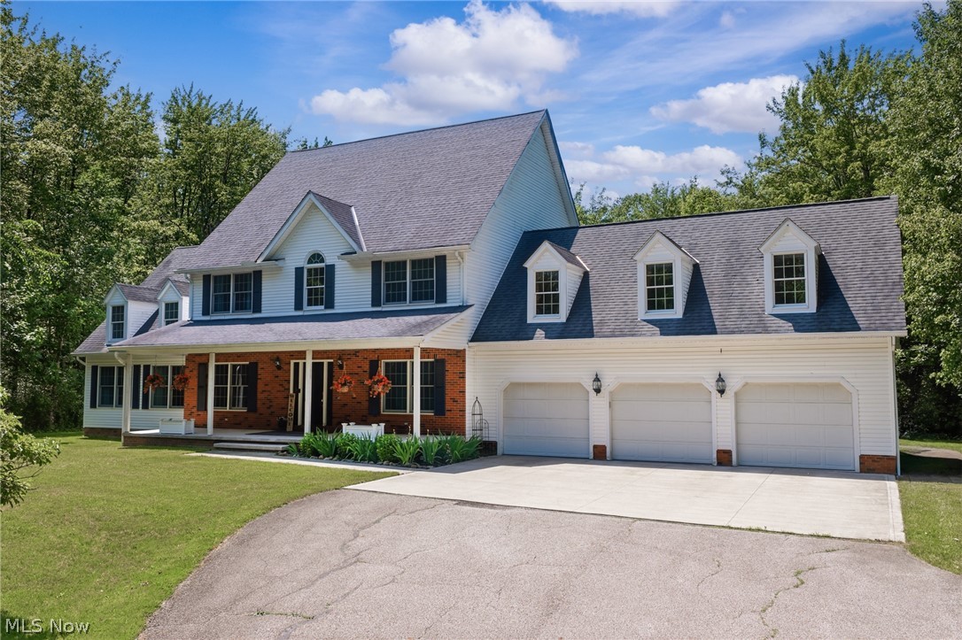 Tucked away on a quiet, picturesque cul-de-sac and set back along a stunning tree-lined drive, this rare Chesterland estate offers the ultimate in privacy, serenity, and natural beauty. Nestled on a lush, wooded 5-acre parcel bordering a sprawling 58-acre farm, this expansive 3,649 sq ft home delivers an unmatched sense of seclusion.

Inside, four generously sized bedrooms, all appointed with a bath, offer space and character, including a first-floor primary suite with soaring vaulted ceilings. The crown jewel is the magnificent sunroom, wrapped on three sides by expansive windows and crowned with skylights that flood the space with natural light year-round. A three-car garage completes this exceptional package. Properties where wooded acreage, stately bedrooms, and stunning sunsets converge rarely become available. This is more than a home. It's a lifestyle.