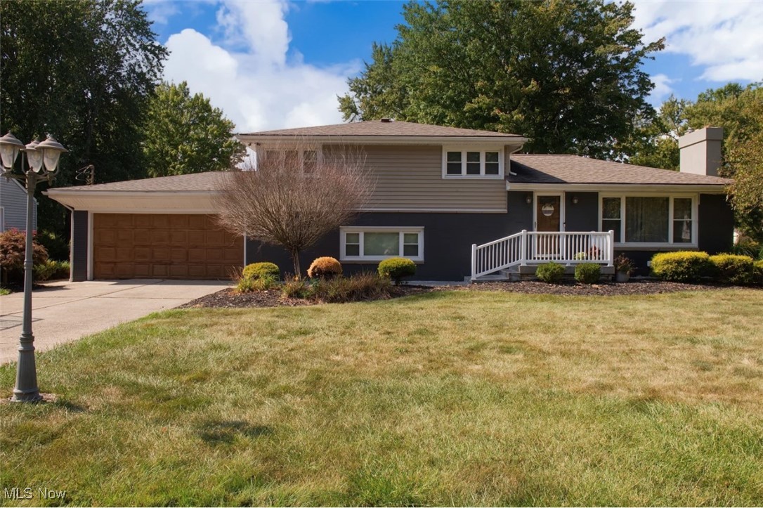 Welcome home this four-bedroom split-level residence, boasting two full bathrooms and a half bathroom, nestled in the esteemed Austintown school district. Upon entering, you’ll appreciate the meticulously maintained living space, featuring a spacious living room offering lots of natural light and a cozy fireplace that seamlessly transitions into a stunning kitchen, complete with granite countertops, ample cabinet space, and generous storage. The dining room area is equally impressive. Ascending to the upper level, you’ll discover the master bedroom, a full bathroom, and two additional bedrooms, all upstairs bedrooms have hardwood flooring. The lower level reveals a beautiful family room with another fireplace, a built-in bar area, an additional mudroom leading to a half bathroom, and a basement area featuring a bonus room with another fireplace, a beautiful shower completed in porcelain tile, a beautiful laundry area, and additional storage. This exceptional home offers air conditioning and a newer roof, replaced within the last eight years. The backyard oasis is perfect for entertainment, boasting an above-ground pool, an outdoor bar area, a fenced-in yard, a separate hot tub area, and a screened-in back porch. Complete with a two-car attached garage and this listing includes another parcel of land. Don’t miss this incredible opportunity – schedule a showing today and make this stunning home yours today!
