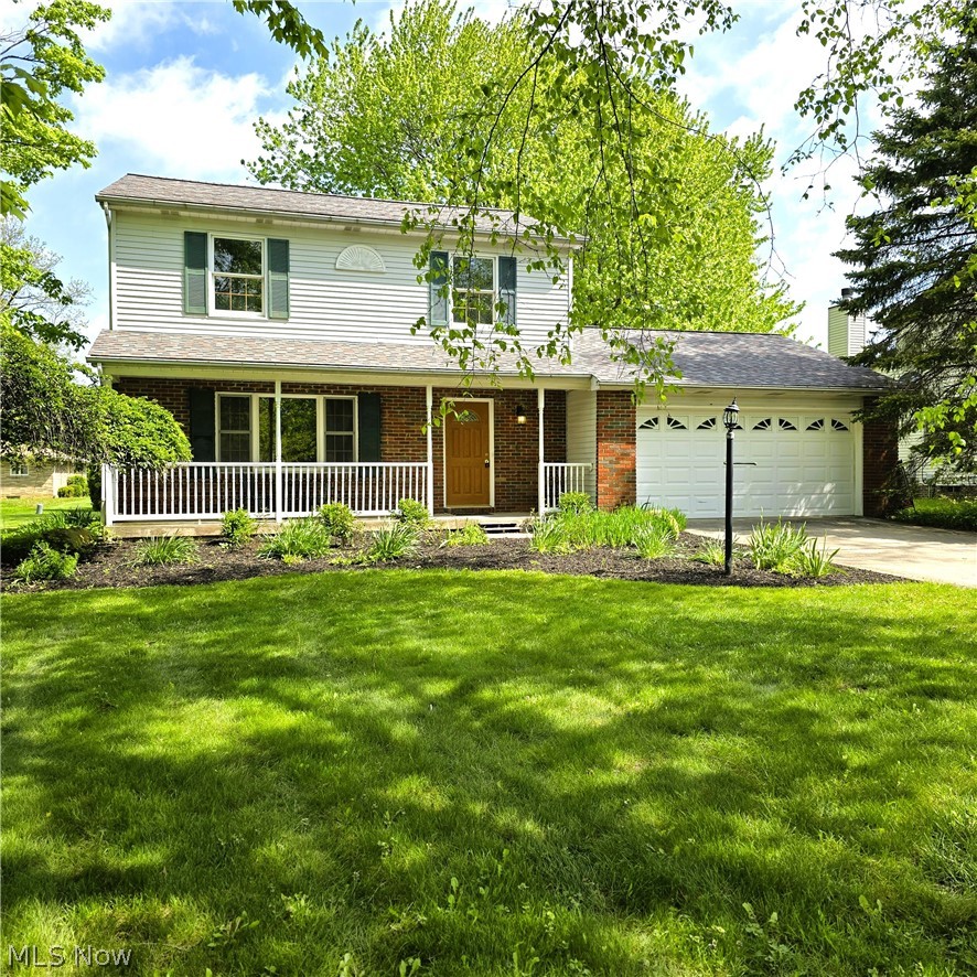 Be first or be sorry! Long time owner took care here! Three bedroom, two and a half bathroom Colonial. Eat-in kitchen has oak cabinets, breakfast bar and all appliances are staying! Big family room has a brick fireplace and a slider leading to a nice deck and private backyard. Living room has hardwood floors. First floor laundry room with extra cabinets and a shower. Owner bedroom has updated full bathroom (2026) and his & her closets. Two additional big bedrooms. Updated main bathroom (2026). Plenty or storage! Newer carpeting (2026) in bedrooms and family room. Front covered porch. Turn around or extra parking space in driveway. Two car attached garage with water spigot, drain, pull down stairs to attic, extra shelving and a door leading to nicely landscaped backyard with mature trees. Easy to show! Immediate possession! Freshly painted with neutral colors and some lighting 2026. Kitchen floor 2024. Roof approx. 2023. Includes one year home warranty!