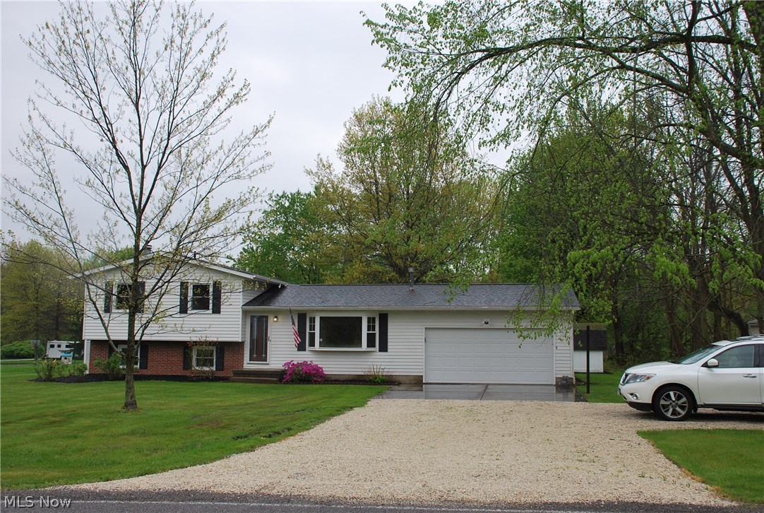 Absolutely gorgeous remodel! All new kitchen, bathrooms, fixtures and flooring. This breathtaking split level home is located on a very large lot perfect for outdoor fun and relaxation. Also features a basement bonus room. You won't want to miss this one!