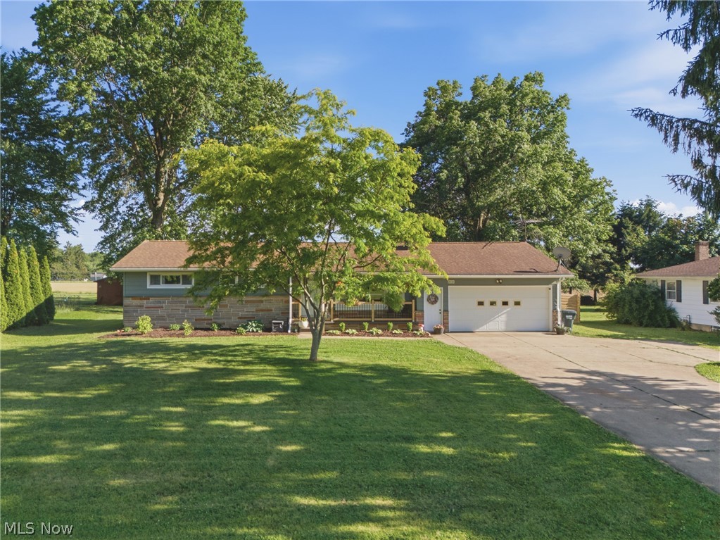 Conveniently located with a country feel, this completely renovated 3-bedroom ranch offers the perfect blend of charm, comfort, and modern updates. Renovated from top to bottom in 2025, the home features custom Amish-built cabinetry, quartz countertops, beautifully updated bathrooms, hardwood floors, a cozy living room with carpet and preserved hardwood flooring underneath, a woodburning fireplace, a finished basement with rec room and office space, and an extensive list of mechanical and cosmetic improvements. Major updates include the HVAC system, electrical panel, plumbing, sewer lines, doors, lighting, flooring, paint, and more. Outside, enjoy a newly fenced backyard, updated landscaping, and a dead-end street setting while remaining just minutes from North End amenities. Combining extensive renovations with an established location, this turn-key home is ready for its next owner.
