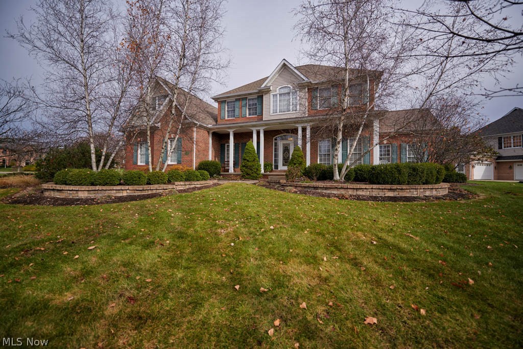 Breathtaking 4 bedroom, 3.5 bath home with open living areas and a first floor master suite in St. James Place! Find your culinary inspiration in the gorgeous kitchen offering a breakfast bar with seating for 6, a dinette, Corian countertops, a deep pantry and center island. It opens to the 2-story great room with an elegant floor-to-ceiling fireplace. Curl up with a good book in the stunning sunroom, featuring tile flooring and vaulted ceilings. The formal dining room has an impressive tray ceiling, wainscoting and crown molding! French doors in the foyer lead to the first floor office with built-in bookshelves and crown molding – the perfect studious environment! Convenient powder room and a laundry room on the main level, too. You’ll adore your royal headquarters – this first floor master suite boasts a vaulted ceiling, walk-in closet and French doors to the spacious private bath with dual sinks and a jetted tub! Upstairs, there are 3 bedrooms, 2 full baths and a wonderful rec room
