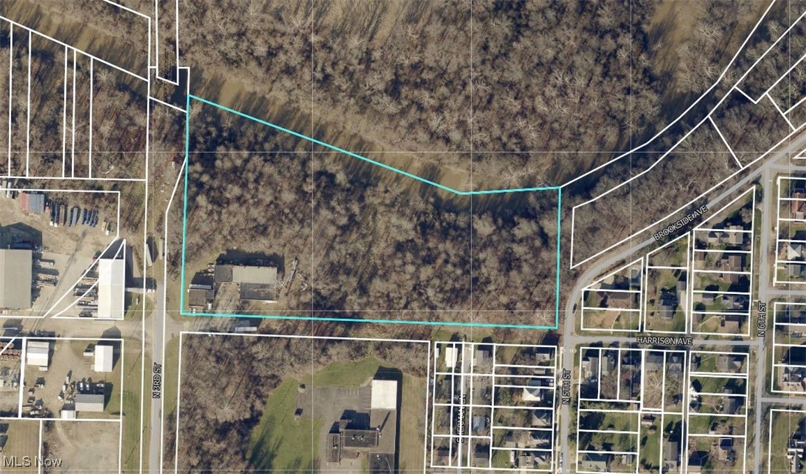 This prime site offers an exceptional opportunity with 7 acres located within the city limits—perfect for commercial or residential development. The property features a 9,942 sq. ft. building that provides endless possibilities for retail, office, industrial, or mixed-use ventures. With ample space for expansion, development, or repurposing, this property is a rare find for investors or developers seeking a versatile and high-visibility location. Don’t miss out on the limitless potential this property has to offer! Contact your local real estate agent today for a private tour.