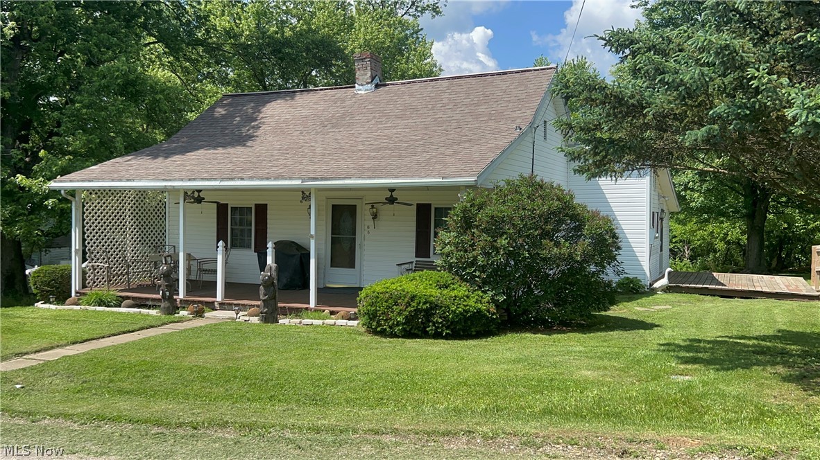 Cute 2 bedroom on quiet street in Mt Sterling, Hopewell area.  This home sits on almost a half acre giving you plenty of space to put in a garden or just enjoy some privacy while spending time on your covered front porch, side deck or around the firepit. Inside you will find a large eat in kitchen with plenty of cabinet space, main floor laundry off the bathroom, cozy living room and 2 large bedrooms.  Gas furnace 12/22, Hot water tank 2021, kitchen cabinets, countertops and flooring all new in 2021-2023. Septic new in 2017.  Public water and new lines 12/22.