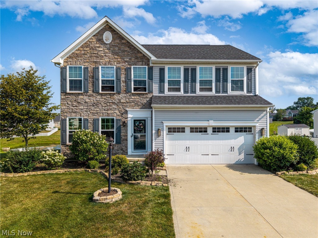 Welcome to this beautifully maintained 2018 Colonial offering 4 spacious bedrooms, 2.5 baths, and the perfect blend of style and function. The attractive partial stone front creates excellent curb appeal, while the extremely functional floor plan is ideal for everyday living and entertaining. The spacious kitchen with granite counters and oversized island makes a perfect gathering spot for family and friends. Upstairs, you'll find four generous sized bedrooms, including a private owner's suite with an en-suite bath and walk in closet. The finished lower level offers additional living space with a full bath-perfect for a recreational room, home office or guest suite. Additional storage areas too on lower level. Step outside onto the low maintenance Trex deck and enjoy peaceful views overlooking the pond, creating the perfect setting for morning coffee or relaxing evenings. Located in a desirable neighborhood, this move in ready home combines modern comfort with scenic outdoor living. A must see!!