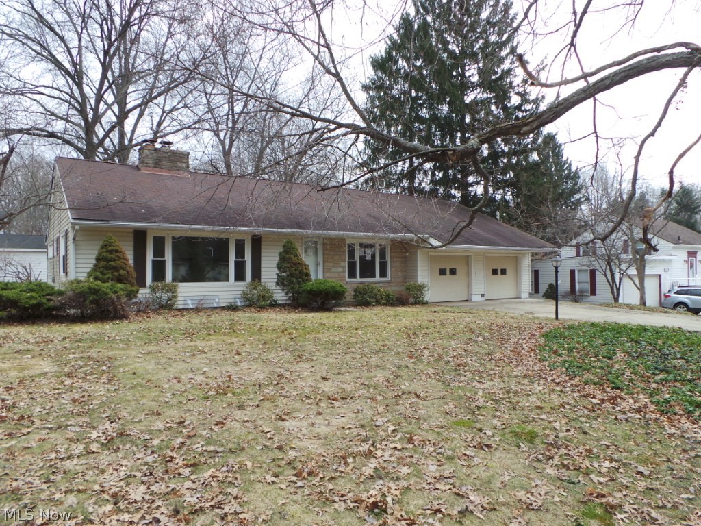 Large ranch style home with 3 bedrooms on the first floor and a basement with a family/rec room with fireplace.  Many built-ins throughout.  The Florida room over looks the nice yard.  The living room also features a nice fireplace.  Property is HUD owned and sold AS IS.