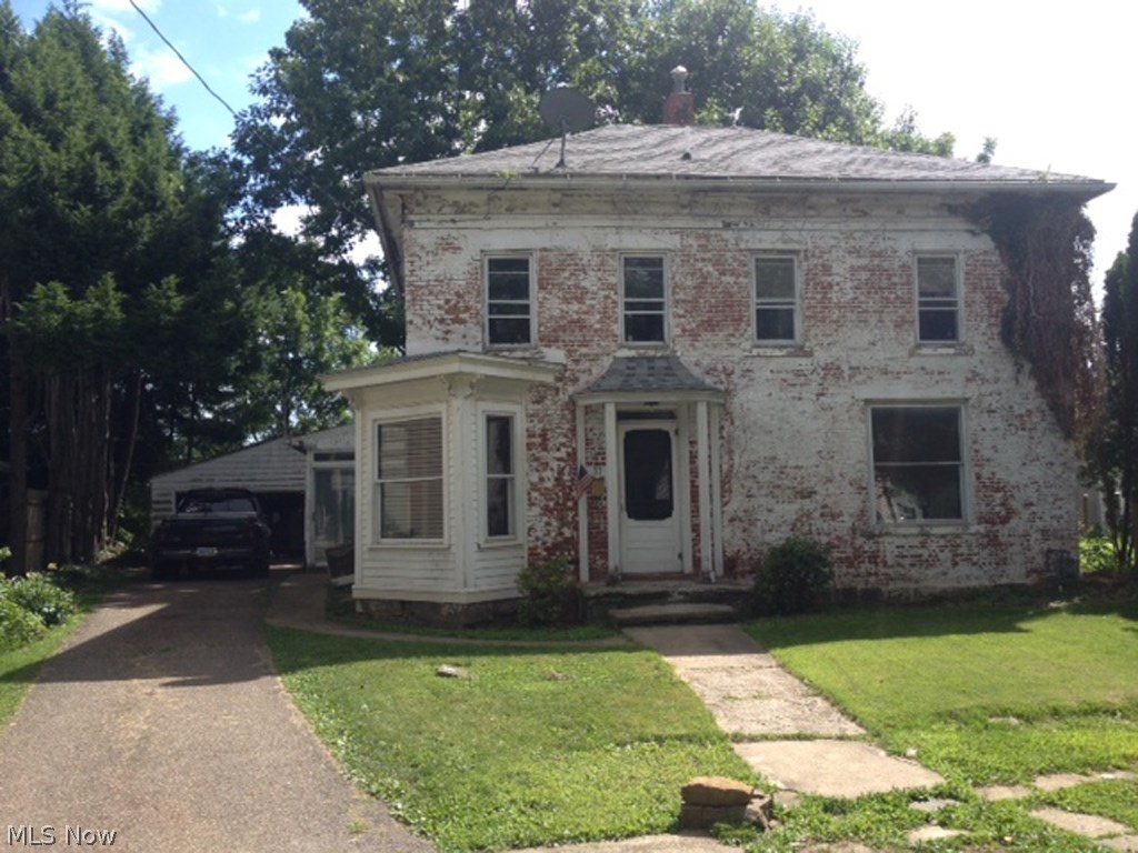 Sells at absolute auction to the highest bidder on location: WEDNESDAY - AUGUST 20, 2014 - 6:00PM
Handyman Brick Home
Large Historic Home - 2 Car Garage
Navarre, Ohio - Stark County
Fairless Local Schools
Real estate features all brick Victorian/Georgian home built in 1840. Three bedrooms and full bath upstairs, main level has nice rear laundry, full bath and pantry, old kitchen, dining room and living room. Nice oak trim, updated shingle roof and large picture windows. Home has modern gas FA furnace & breaker elec. Detached 2-car garage & blacktop driveway. Property adjoins old canal route. Home needs handyman touches. Bring you contractor. Taxes $326.51 per 1/2 year.
TERMS ON REAL ESTATE: 15% down auction day, balance due at closing. A 10% Buyer’s premium will be added to the highest bid to establish the purchase price.  Any desired inspections must be made prior to bidding. All information contained herein was derived from sources believed to be correct.