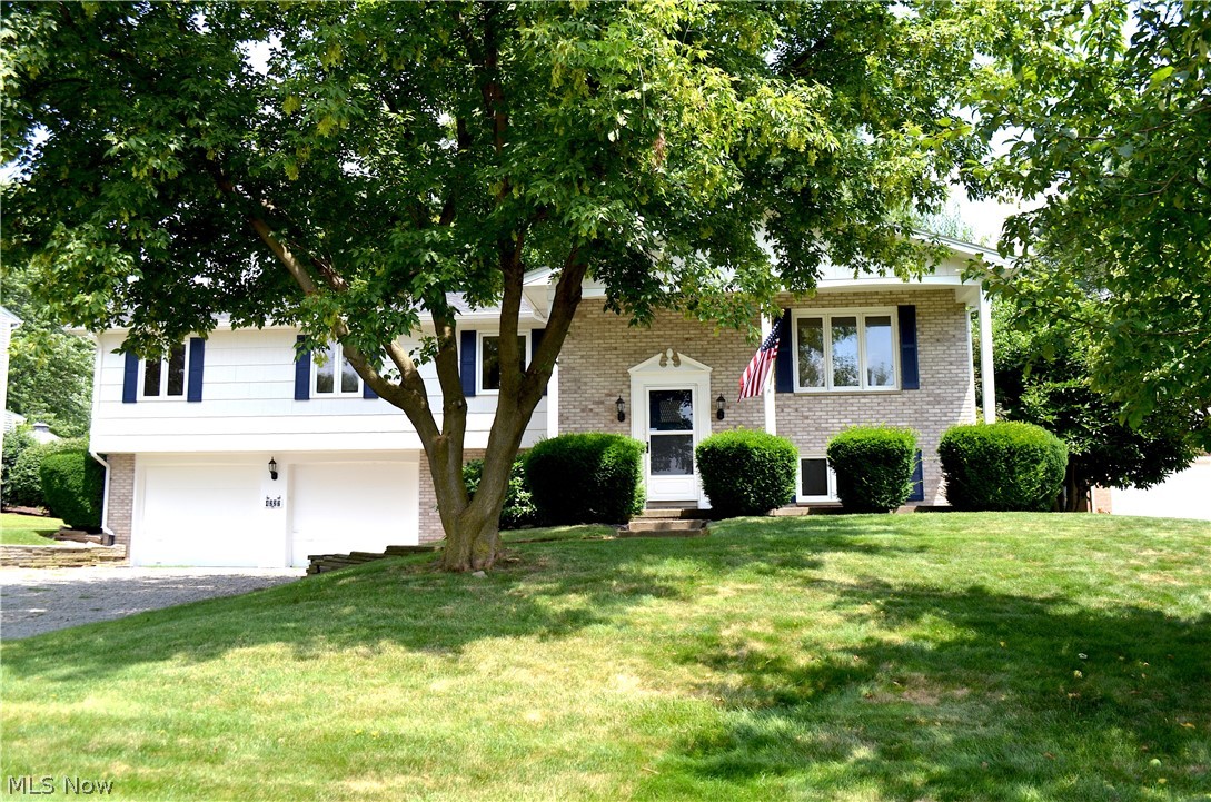 SPACIOUS SPLIT LEVEL HOME IN PLAIN LOCAL SCHOOLS! Conveniently located near shopping, restaurants, and highway; this 4 bedroom 2.5 bathroom home has been updated from the inside out! The main level offers an open floor plan that's great for entertaining. The kitchen features marble counter tops, new stainless steel appliances, subway tiled back splash, tons of cabinet space with laminate wood floors that flow into the dining room with access to the balcony overlooking the backyard. Just off of the dining room is the living room with a large window allowing for natural light to brighten the room. The lower level features an additional family room with built-in storage as well as access to the enclosed porch. A private master suite can be found on the main floor and offers a spacious walk-in closet and master bath. The additional bedrooms each offer nice closet space and access to the full bath w/ marble counter tops and laminate flooring. The basement has a half bath, office and laundry