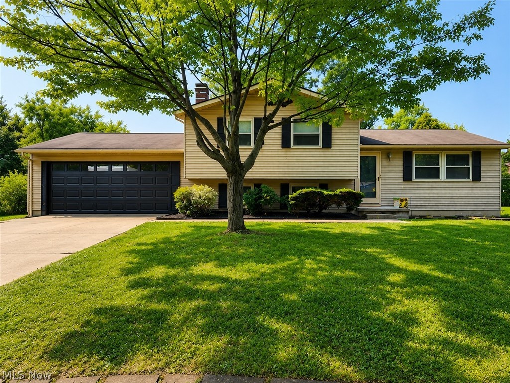 Welcome home to this spacious 4-level split nestled in one of Stow's established neighborhoods! Offering over 2,200 square feet of living space, this home features 3 generously sized bedrooms and 2 full bathrooms, providing plenty of room for everyday living and entertaining. The inviting living room flows into the dining area and kitchen, while oversized family room offers a great entertaining space to use however you wish. The lower level bonus room can be an additional bedroom, office or anything that you need. The finished lower level provides additional flexible space for a recreation room, workout area, or playroom. Outside, you'll appreciate the private, wooded fenced backyard, ideal for entertaining, gardening, or simply enjoying nature. A rare 4-car garage provides exceptional space for vehicles, hobbies, storage, or a workshop.

Conveniently located near parks, shopping, restaurants, and major highways, this home offers the perfect combination of space, functionality, and location. Don't miss your opportunity to make this Stow home your own!