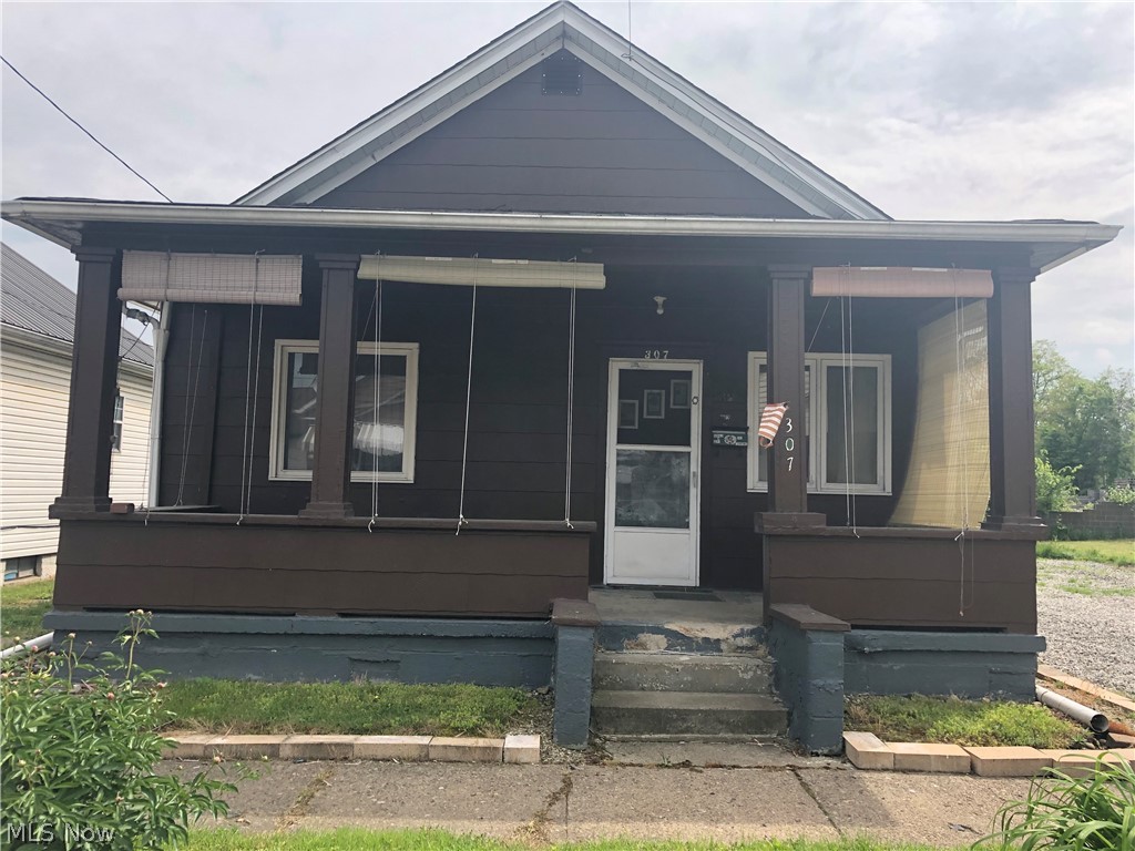 Buy this home for less than you can pay rent! 2 bedroom home on a dead in street.  Within walking distance to the grocery store and bank.  Just seconds from Rt 7.  Furniture in the house will stay.  Level flat back yard.