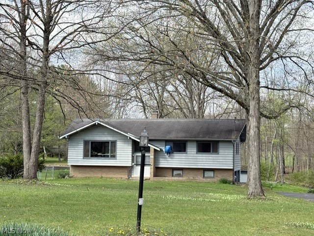 Welcome to this unique 5-acre parcel located in Edinburg Township with a Rootstown mailing address.  As you enter the property from Porter Rd you will be greeted by a grand old two-story barn and a must have three car detached garage.  There is also an additional two car garage attached to the main home. Wow, 5 garage bays. This home is a split level with three full bedrooms, two full baths and one-half bath. Built in 1965 with approximately 1790 square feet. The second home located on the property is a two-bedroom, one full bath home. Built in 1975 with approximately 624 square feet. Buyer and or buyer's agent is responsible to check with zoning on use of the second home it is not a licensed rental. Both homes are waiting for your love and updated personal touch. Outside we have a beautiful pond, fenced pasture, a gazebo, woods and a winding creek. Call today