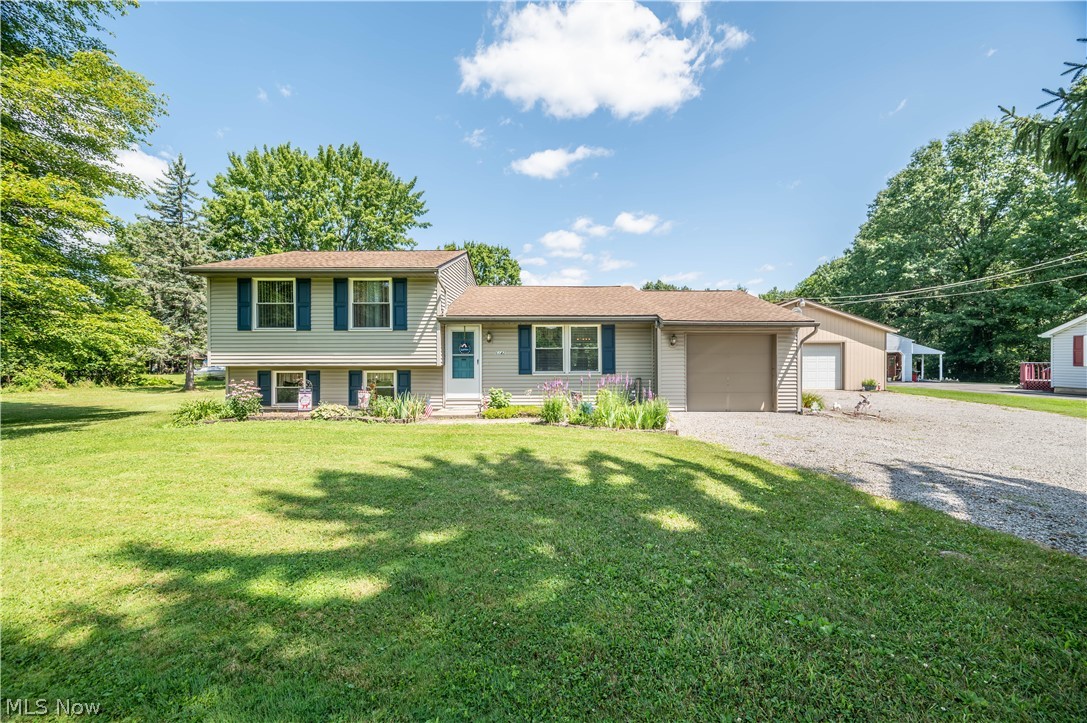 Welcome to this charming 3-bedroom, 1-bath split-level home nestled on over 2 peaceful acres, offering the perfect combination of comfort, functionality, and country-like privacy.
Inside, you’ll find a spacious and inviting layout with multiple living areas, providing plenty of room for everyday living, entertaining, or relaxing. The split-level design offers a practical floor plan with comfortable bedrooms and abundant natural light throughout and includes some new updates to paint, carpet and light fixtures and well as a High Efficiency Furnace.
Outside is where this property truly shines. The beautifully maintained backyard is a private retreat featuring a picturesque 16 ft deep pond surrounded by mature trees, creating a peaceful setting to enjoy your morning coffee, host gatherings, or simply unwind while taking in the scenic views.
In addition to the attached garage for everyday convenience, the property also includes an impressive detached 4-car garage, offering endless possibilities for car enthusiasts, hobbyists, contractors, workshop space, extra storage, or recreational equipment.
With more than 2 acres of land, there’s plenty of room for gardening, outdoor activities, pets, or future expansion while still enjoying the tranquility of nature. Whether you’re looking for extra space, versatile outbuildings, or a serene setting to call home, this property offers a rare opportunity to enjoy it all.
Don’t miss your chance to own this one-of-a-kind property that combines comfortable living, exceptional garage space, and a beautiful natural setting—all while being conveniently located near everyday amenities.