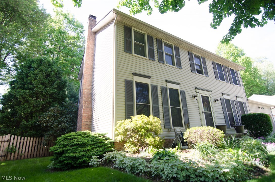Picture perfect colonial in Ellet Woods.  Located on the cul de sac of Yerrick Cir, the mature trees and gorgeous landscaping provides a private retreat.  This one owner home has been meticulously maintained and updated.  Ceramic tile entryway leads you to the heart of the home.  You will find a coat closet and half bath off of the main floor hallway.  The living room has a wood burning fireplace, accent lighting, a beautiful (nearly floor to ceiling) bay window and wide open flow into the eating area.  Here you have room for your breakfast table and sliders provide access to the back deck.  The crisp, clean kitchen offers lots of countertop and cabinet space, a large pantry, composite granite sink, copper backsplash and stainless appliances that are all included. There is also a dining room for your formal meals.  On the second level there are 3 bedrooms, a full bath, the large master bedroom and master bathroom with a walk in closet.  Ceiling fans in all bedrooms, 2 linen closets. On