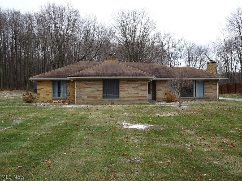 Gorgeous country living. Large windows through out. Large 3 bedroom brick ranch on 1.5 acres in a great location. All the rooms are very large and spacious. The eat in  kitchen has massive amount of cabinet space with island with additional bar seating! This home is an entertainers dream with a  dining room that has plenty of seating to host all of your parties! First floor laundry. Extra-large master bedroom with gas fireplace. Large storage building with lofts to store your outdoor equipment.  Bring your finishing touches and make this your new home.
