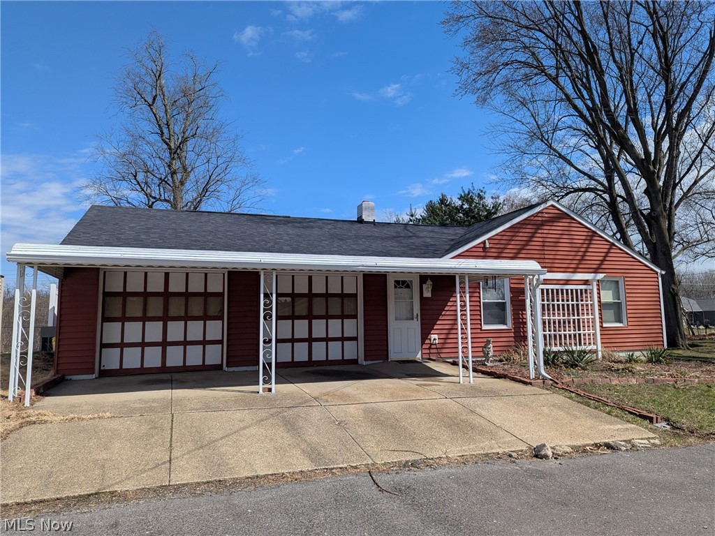Charming one-story ranch in Portage Lakes area of Coventry Township, with a view of the North Reservoir! This 2-bedroom, 1-bath home offers 882 square feet of living space and includes a bonus room that could serve as a home office, den, or possibly a third bedroom. Features include an attached garage and car port, partially fenced yard. Stainless steel appliances included.  Low maintenance exterior of brick and vinyl.  Quick and easy access to shopping and all that the Portage Lakes has to offer.