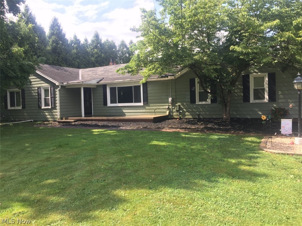 Talk about updates! This very well-maintained ranch-style home in the West Branch Local School District has numerous updates including a new well, a new garage door and a new shed. And that's just on the outside! Inside, you'll find an updated kitchen, freshly refaced cabinets, new counter tops and a new washer/dryer set.
The property provides lots of outdoor space for entertaining, especially with a freshly power-washed front porch and a brick patio off the back.
Need storage? A very spacious attic supplies the owner with all they'll need. The garage has built-in storage lockers and cabinets. And don't forget that new shed in the back!
Stay warm with the fireplace in the living room and keep cool with the central air system.
